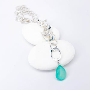 Silver chain with a turquoise teardrop charm