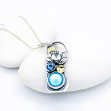 Sterling Silver Opalite and Blue Topaz Lotus Necklace - DawnsArtisanJewelry.com